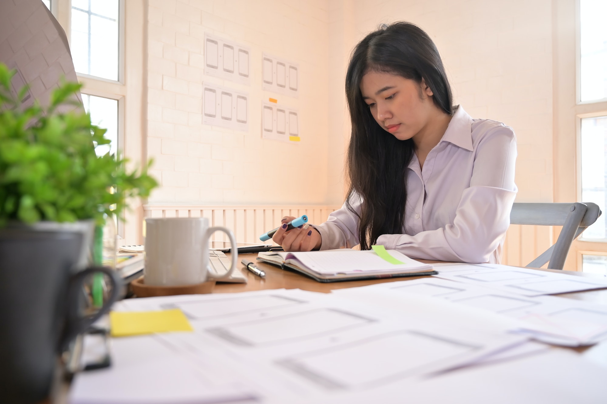 Web designer working and planning application with developing template framework.